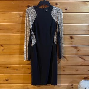 Midi Xscape black dress w/ bedazzled sleeves